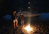 Kids enjoying the camp fire on Hawkesbury River  with Cygnet 20 in background