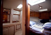 Bluewater 420 Raised Saloon | King size owner V-berth with forward head