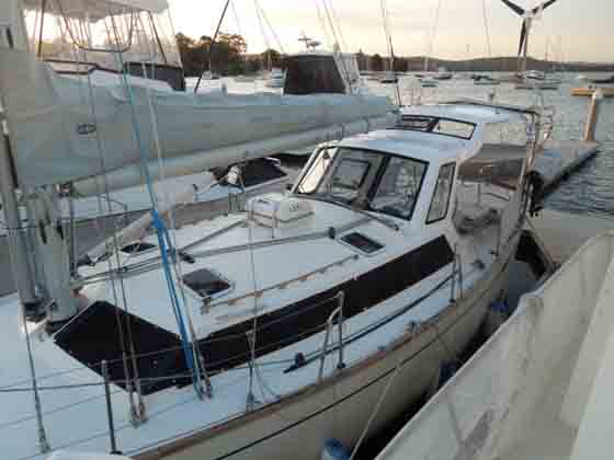  "After" showing new GRP non skid deck and hard dodger/bimini